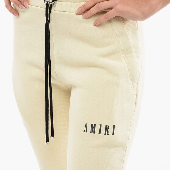 Amiri Cream Joggers with Black Drawstring & Printed Logo - Picture 1 of 4